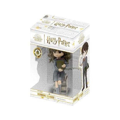 FIGURINE HARRY POTTER HERMIONE GRANGER SUR UNE PILE DE LIVRES - La Case Au Tresor